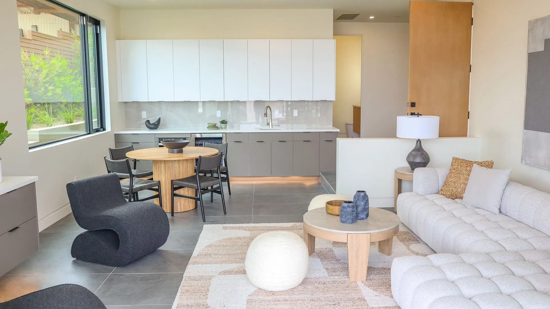 Modern kitchen with bright finishes and strong task lighting